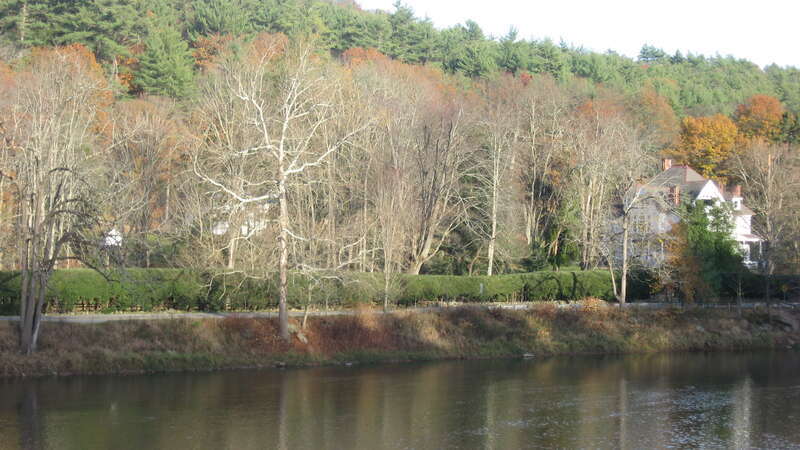 Overview of the Anthony Wayne Cook Mansion and its estate, located along the Clarion River in Barnett Township, Forest County, Pennsylvania, United States.  Photo looks east from the Pennsylvania Route 36 bridge over the river.  Built in 1880, the