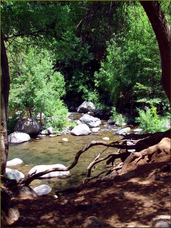 (1 in a multiple picture set)
Finally, we are at the bottom of the canyon (though we are still some altitude above the town of Sedona about 10 miles ahead).  Oak Creek ripples through this very scenic spot where a small village called 'Indian