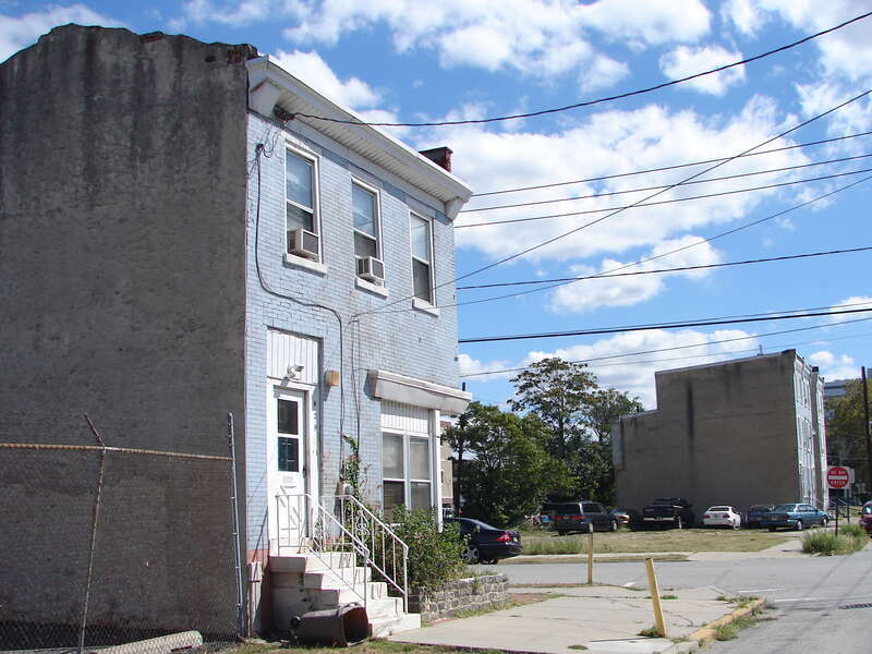 George Whitman House on the NRHP since October 11, 1990. At 431 Stevens St., in Camden, New Jersey.  George was the brother of Walt Whitman who lived a couple blocks away.  The house pictured is actually 429 Stevens St. and the grassy lot with the