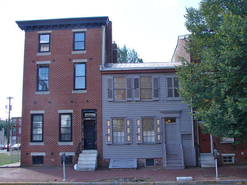 &quot;Walt Whitman Neighborhood&quot; as listed by the NRHP since January 20, 1978. At 326-332 Mickle St. (generally known as Martin Luther King Drive) in Camden, New Jersey.  This name is something of an artifact of the NRHP.  The wooden house in the middle