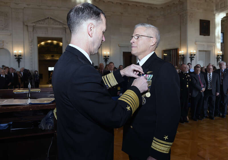 Rear Adm. Matthew Klunder receives the Distinguished Service Medal from Adm. John Richardson, director, Naval Nuclear Propulsion Program, during his retirement ceremony held at the United States Naval Academy. (U.S. Navy photo by John F.