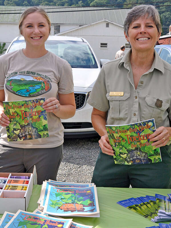 Monongahela National Forest employees Kristen Doss and Anne Workman provided activities for children and showed off a new book called “The Pests that Girdle the Home of Tucker the Turtle” at the Pocahontas Country Opera House in Marlinton, West