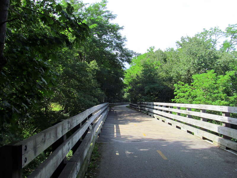 Wooden-decked bridge carrying the South County Bike Path over the Saugatucket River in the Wakefield section of South Kingstown, Rhode Island