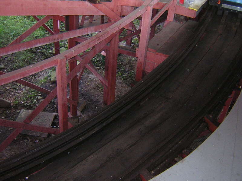 A scene from Kennywood, an amusement park located in West Mifflin, Pennsylvania on the Monongahela River.
This is a view of the Racer, a wooden roller coaster. It is a racing,  moebius loop coaster; one of only three in the world. The current Racer