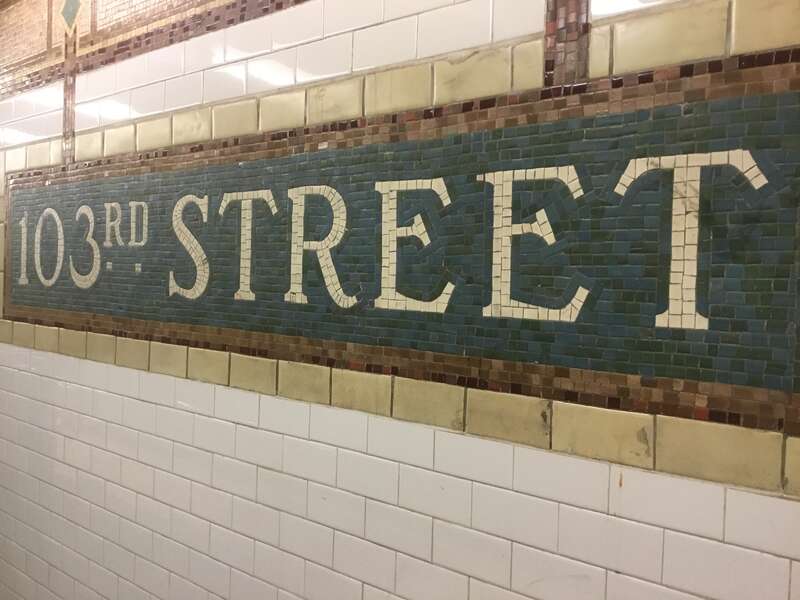 Mosaic name tile for the 103rd Street Station