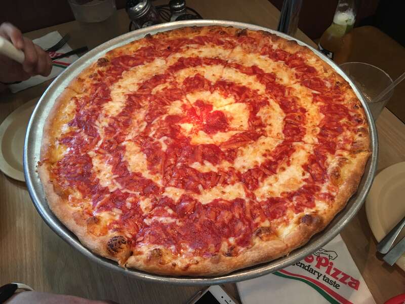 A pie of cheese pizza at the Grotto Pizza restaurant in Dover, Delaware