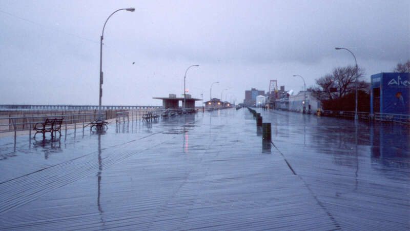 500px provided description: Coney Island boardwalk in Brooklyn, New York on a cold and rainy Sunday afternoon in late March 2003. [#boardwalk ,#New York ,#Brooklyn ,#Coney Island]