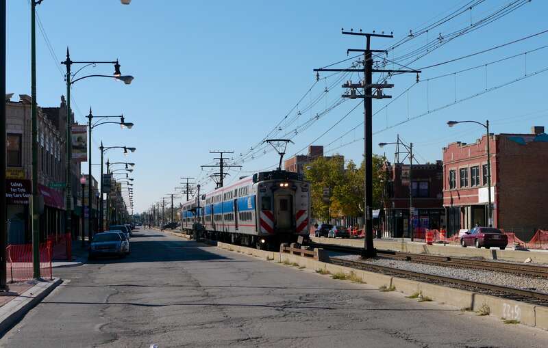 A Metra Electric train running in 71st Street passed our tour many times