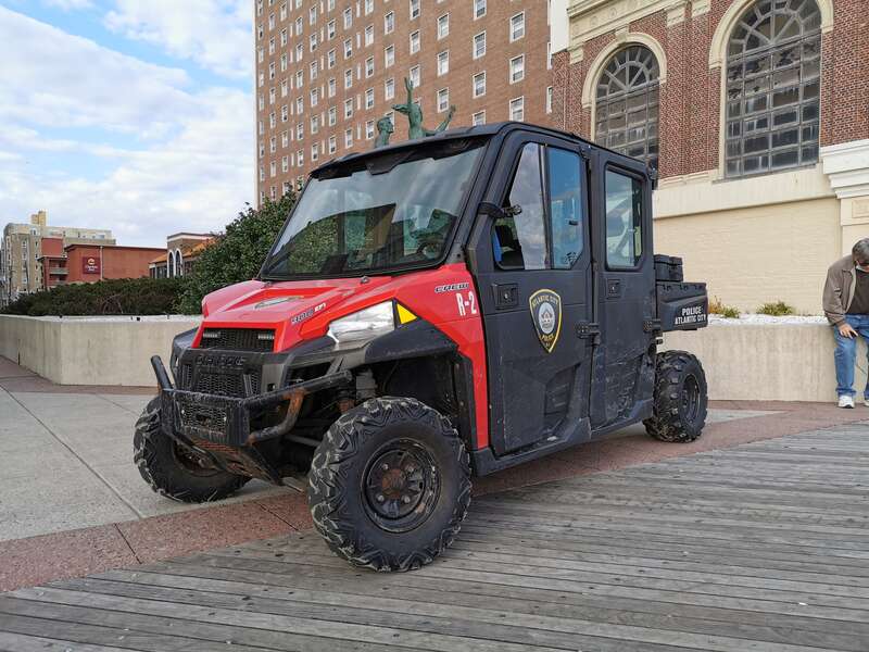 A Polaris Ranger Crew 900 EFI DOHC all-terrain vehicle patrols the Atlantic City Boardwalk under the authority of the Atlantic City Police Department. (¾ view.)
The sculpture  “Summer” by Anthony Frudakis and the Tropicana casino are visible in the
