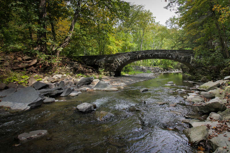 500px provided description: Bridge Ithaca [#Nature ,#Forest ,#Rocks ,#Wood ,#Water ,#NY ,#River ,#Rock ,#Ithaca ,#Falls ,#New York State]