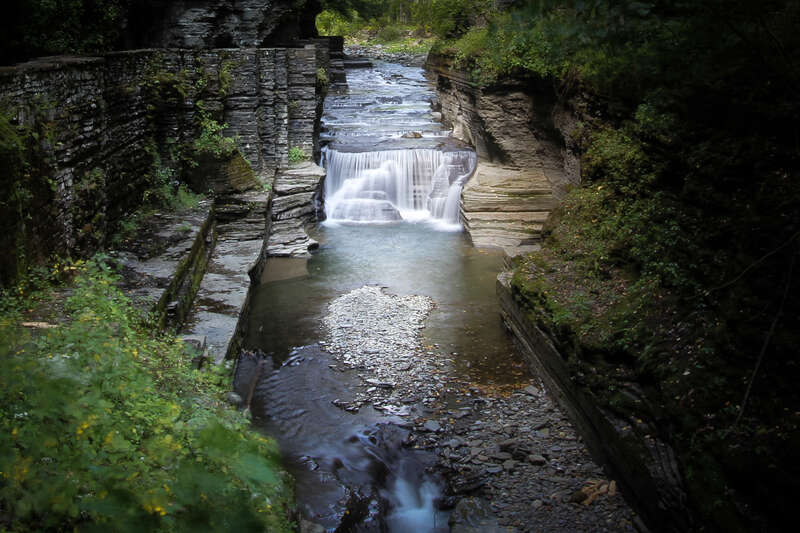 500px provided description: One of the wonderful fall you can see between rocks and dozen of steps [#Nature ,#Forest ,#Rocks ,#Wood ,#Water ,#NY ,#River ,#Rock ,#Ithaca ,#Falls ,#New York State]