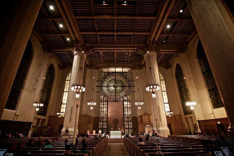 The baptismal font near the sanctuary entrance.