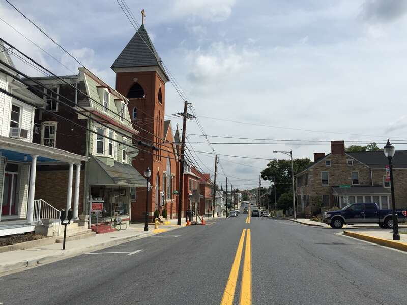 View east along Maryland State Route 77 and south along Maryland State Route 550 (Main Street) between Municipal Street and Center Street in Thurmont, Frederick County, Maryland