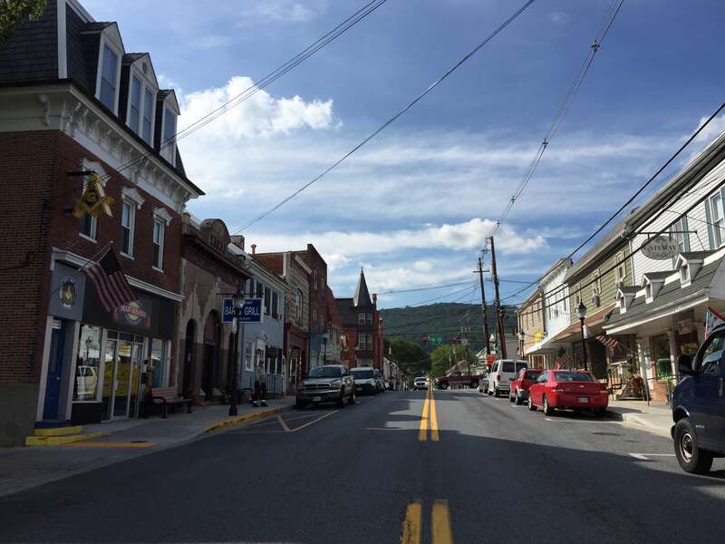 View west along Maryland State Route 77 and north along Maryland State Route 550 (Main Street) between Center Street and Municipal Street in Thurmont, Frederick County, Maryland