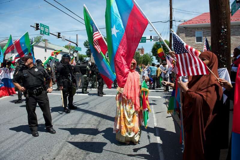 Photo of police and protesters in down town Thurmont during the 38th G8.