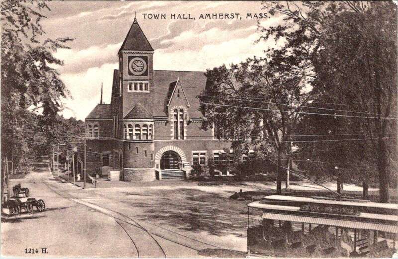 Undivided back postcard of Amherst town hall with a Holyoke Street Railway streetcar at right