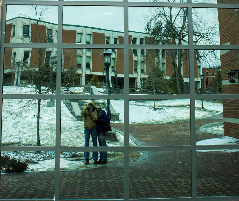 500px provided description: My wife &amp;amp; I.  This is me trying to be artistic. :D [#reflection ,#window ,#abstract ,#snow ,#canon ,#wife ,#ice ,#rebel ,#self-portrait ,#eos ,#550d ,#t2i ,#askew ,#North Carolina ,#Boone ,#ASU ,#Kathryn ,#App State]