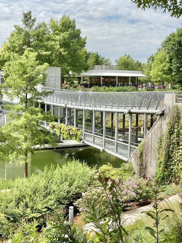 Built in 1983-1985, this Modern building was designed by Conklin and Rossant as part of the construction of the Myriad Botanical Gardens, which began construction in 1971.  The building consists of a large cylinder that is 224 feet (68 meters) long