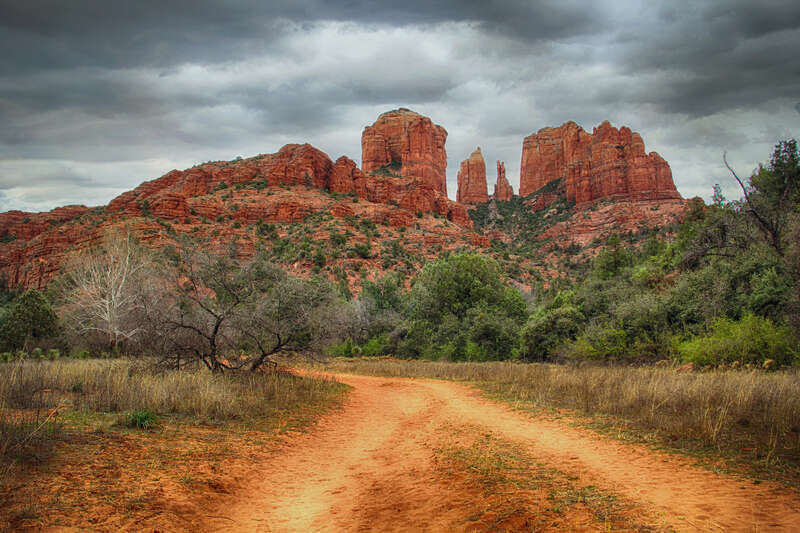 500px provided description: Another shot of Cathedral Rock in Sedona, AZ.  Playing with leading lines. [#trees ,#sky ,#clouds ,#road ,#rocks ,#arizona ,#sandstone ,#southwest ,#sedona ,#red rock ,#cathedral rock]