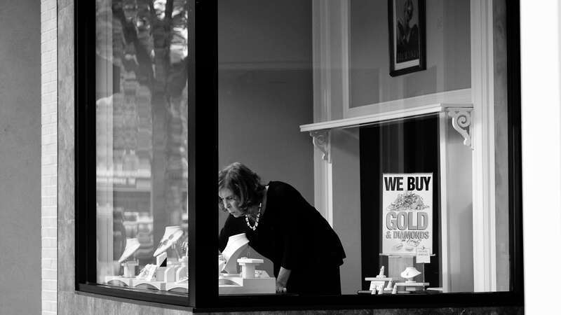 500px provided description: Lost [#window ,#lady ,#glass ,#blackandwhite ,#jewelry ,#store]