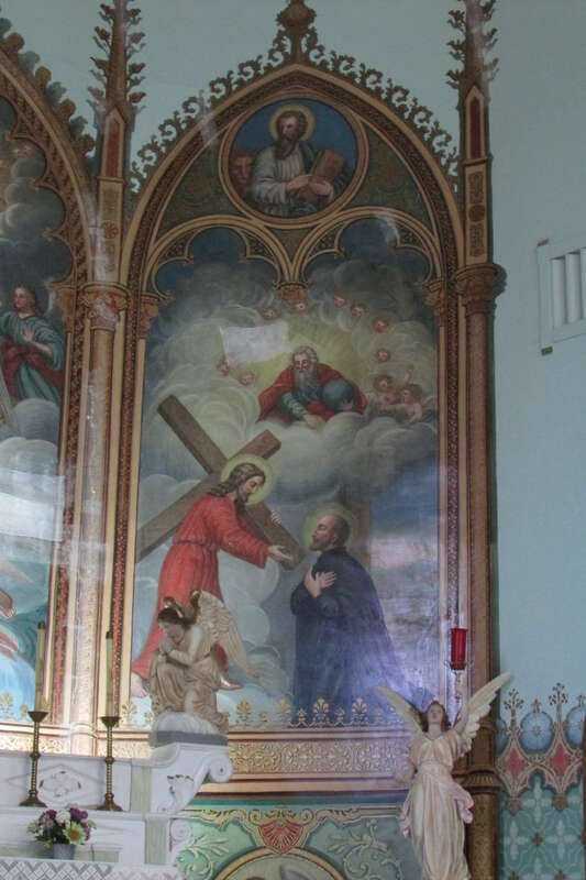 The Triptych behind the altar of St. Ignatius Mission Church, painted by Brother Joseph Carignano in 1890.