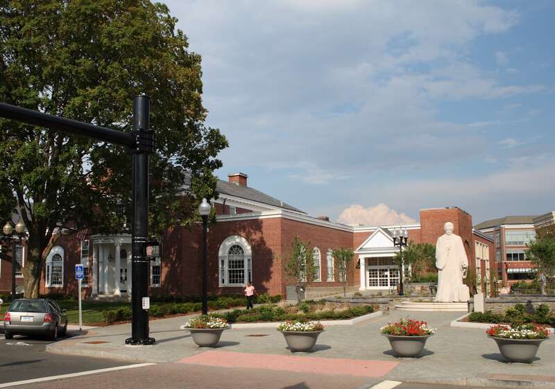 The current site of the Noah Webster Memorial Library, 20 S. Main St. in West Hartford, Connecticut, with Korczak Ziółkowski's statue of Noah Webster
