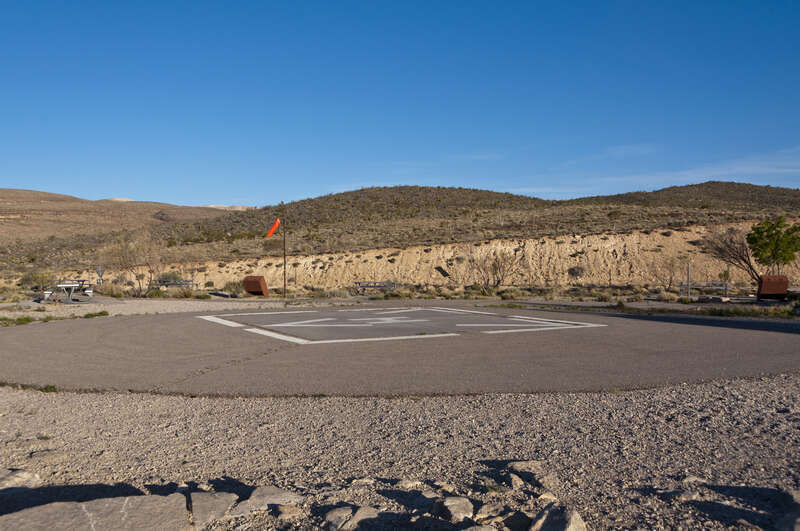 Red Rock Canyon Observation Point Helipad, located at the Red Rock Canyon overlook area off Blue Diamond Road (SR 159). A concrete and asphalt helicopter landing pad used primarily for emergency response such as the Clark County Sheriffs Dept., EMT