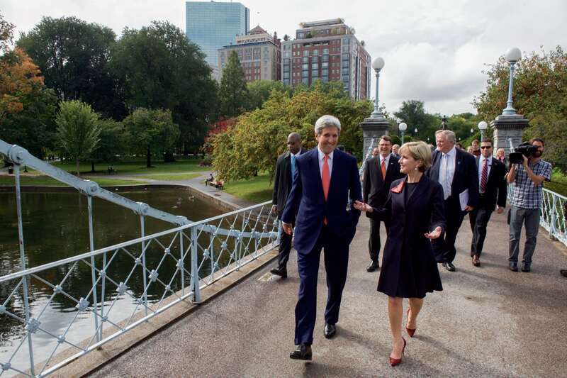 U.S. Secretary of State John Kerry escorts Australian Foreign Minister Julie Bishop through the Boston Public Garden on October 13, 2014, after he and U.S. Defense Secretary Ash Carter held their first round of meetings with their Australian