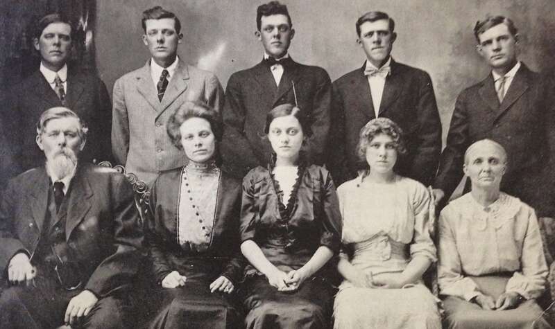 Family photograph. Rear: Herman, Albert, Edward, Carl, Henry Kostboth. Front: Charles, Mame, Katherine, Amelia, and Catherine Kostboth. A copy of this photo is available on page 333 of "Canistota: Our Heritage and History" (1984).