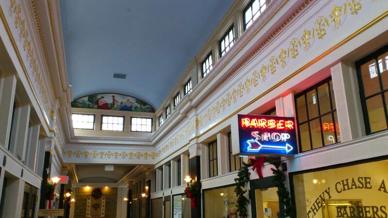 Historic arcade in the low-scaled streetcar retail corridor of Chevy Chase, D.C. Lovely interior, but high vacancy.