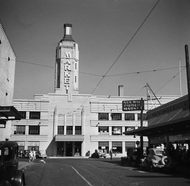 The Portland Public Market, in Portland, Oregon.  The building was completed in 1933 and was located along Front Street (later named Front Avenue, and now Naito Parkway), with its back being along the Willamette River "sea wall". The market closed in