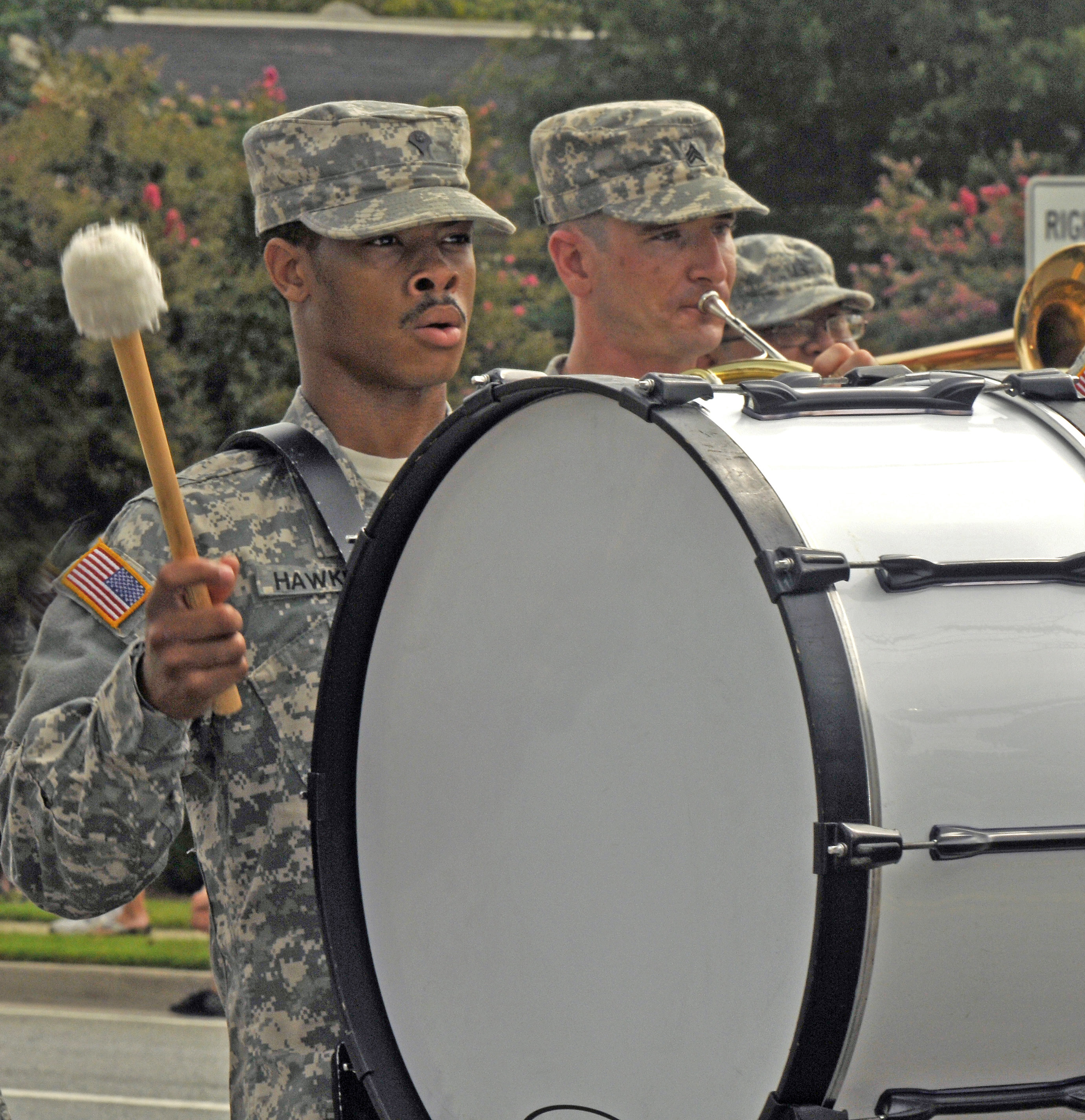 Georgia Army Guard Spc. Darius Hawkins, the 116th Army Band’s bass drummer, “beats time” out for his fellow bandsmen as the unit makes its way past the crowd of people who came to watch Alpharetta’s annual Old Soldier’s Day Parade.

(Photo by Spc.