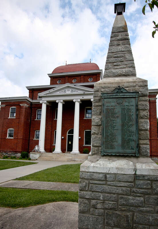 The 1904 Ashe County courthouse and World War II Honor Roll monument located in Jefferson, NC
