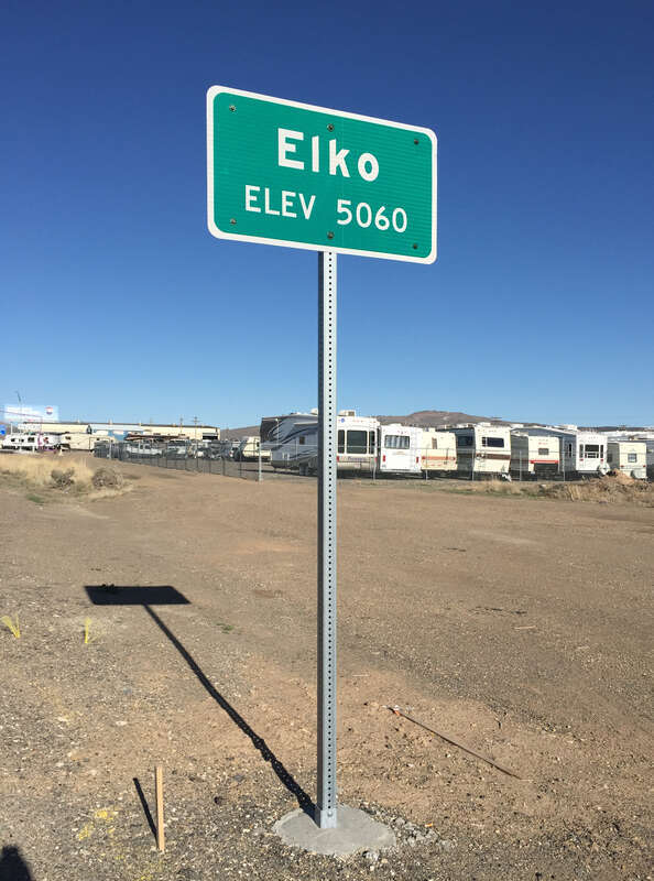 Entering &quot;Elko, 5060&quot; feet above sea level sign on Idaho Street (Nevada State Route 535 and Interstate 80 Business) in Elko, Nevada