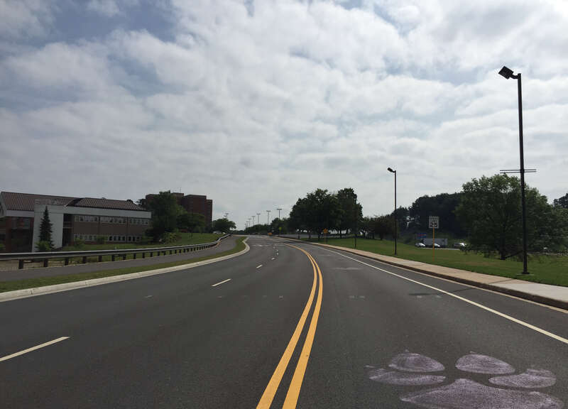 View north along Virginia State Route 331 (Bluestone Drive) just north of Virginia State Route 253 (Port Republic Road) at James Madison University in Harrisonburg, Virginia
