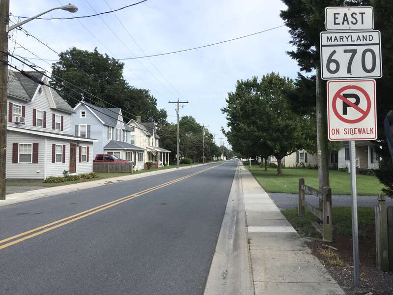 View east along Maryland State Route 670 (Lillian Street) at Maryland State Route 347 (Main Street) in Hebron, Wicomico County, Maryland