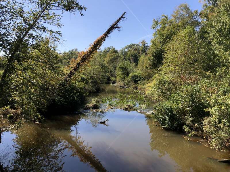 View northwest down the Millstone River from the bridge for County Route 539 along the border of Cranbury Township, Middlesex County and East Windsor Township, Mercer County in New Jersey