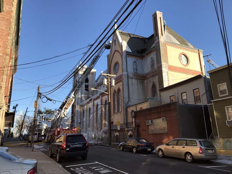 Looking east on 14th Street from the corner of Summit Avenue in Union City, in the late afternoon of March 4, 2017. Pictured is the remains of SS. Joseph and Michael Parish Church on Central Avenue, to which a fire that started around 1am EST on