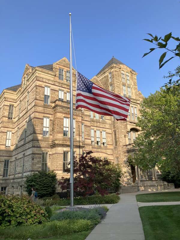 Adelbert Hall on the campus of Case Western Reserve University in Cleveland, Ohio, United States, seen with an American flag at half-mast on the anniversary of the September 11 attacks
