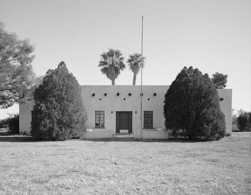 Front of the adobe administration building at the 'USDA Tucson Plant Materials Center' — located at 3241 N. Romero Road in Tucson, Arizona, United States. 
The adobe building was built in 1935 as an agricultural research center, and is listed on the