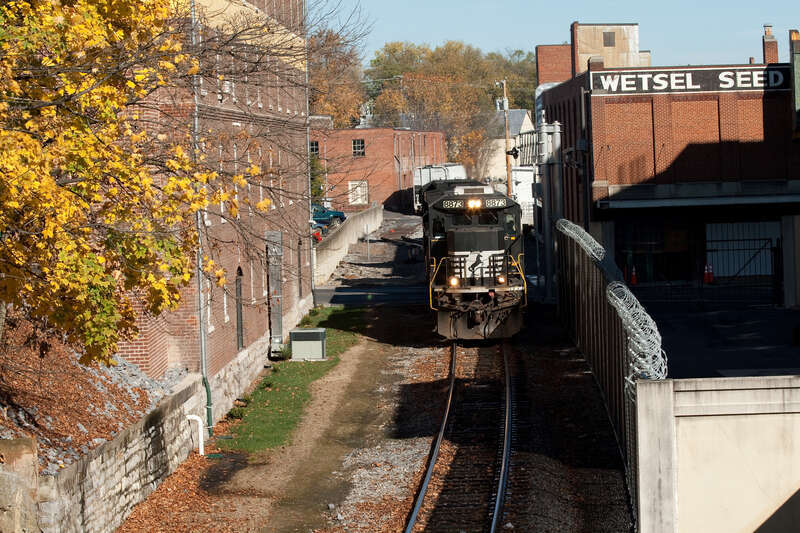 NS 8873 and NS 9760 are winding their way through downtown Harrisonburg, VA after assisting in switching duties on the noth end of town.