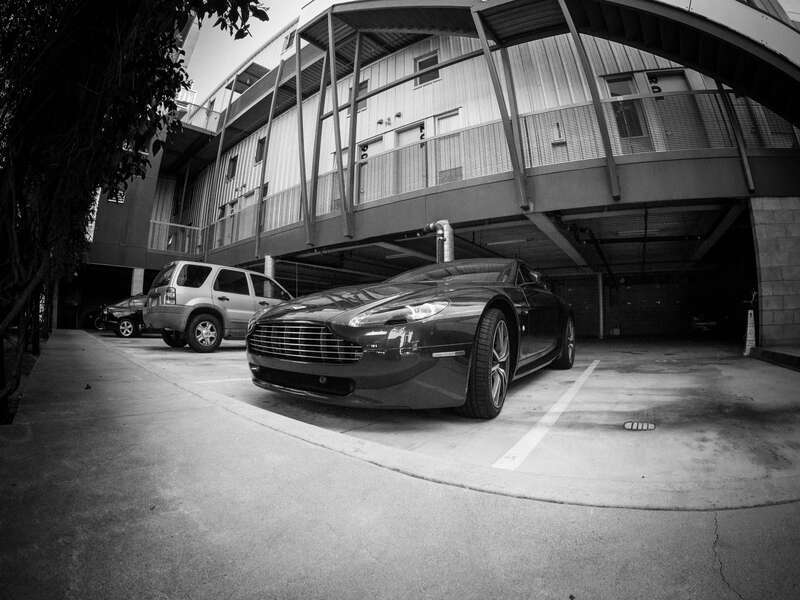 500px provided description: Such a gorgeous car! [#black and white ,#aston martin ,#aston ,#dream car]