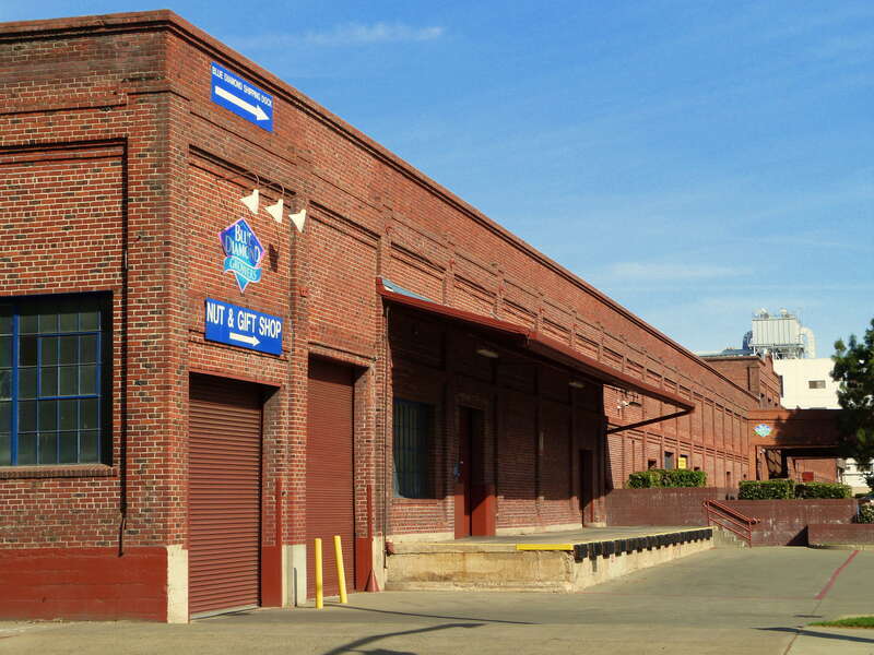 The historic Calpak Plant No. 11 (built 1925), located at 1721 C Street in Sacramento, California, United States, is listed on the US National Register of Historic Places. As of the photo date, it is an almond-processing plant for the Blue Diamond
