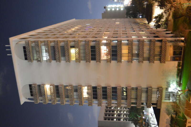 Northern end and western side of the Cambridge Tower, located at 1801 Lavaca Street in central Austin, Texas, United States.  Photo is taken from a balcony on the highest level of the AT&amp;amp;T Executive Education and Conference Center, across MLK to