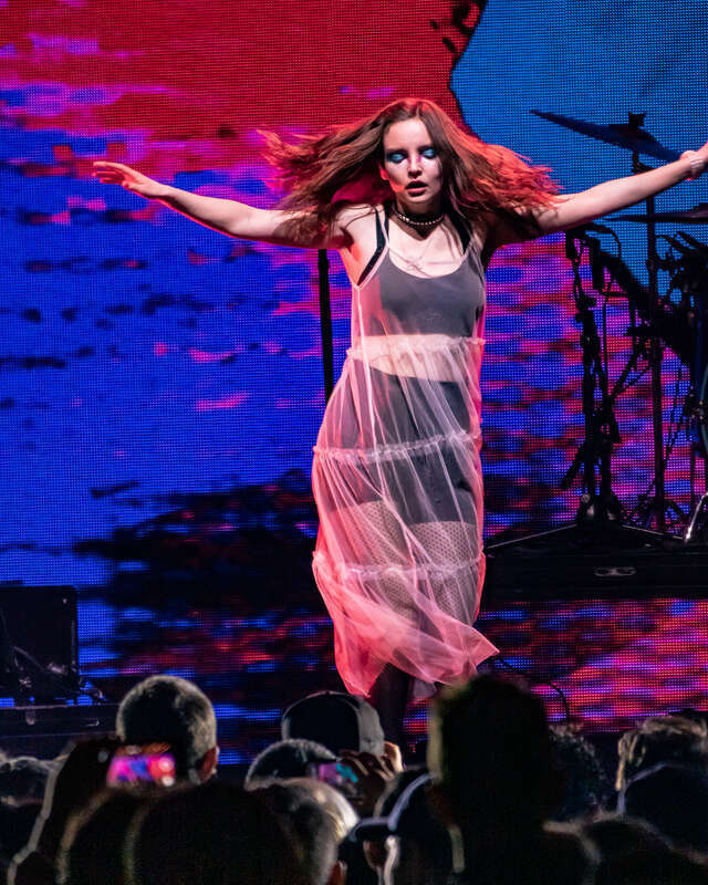 Chvrches performing live at The Forum in Inglewood, Los Angeles, California, on Sunday, December 9, 2018. Part of the KROQ Almost Acoustic Christmas concert.