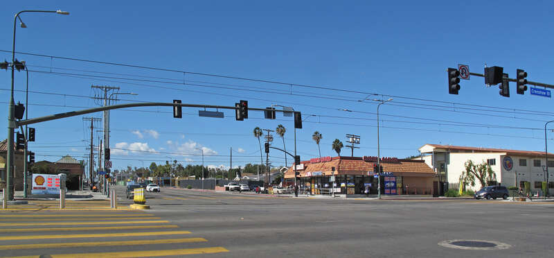 Looking west on Slauson Avenue from Crenshaw Boulevard, Los Angeles. The Hyde Park station of the Los Angeles Metro K Line is just to the left of the photographer. See annotation.