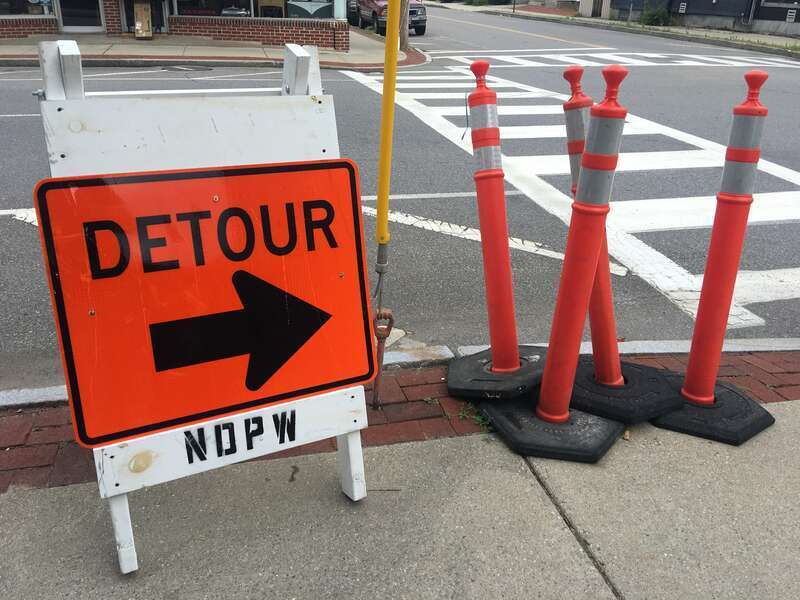 A detour sign on the corner of East Pearl and Spring Streets in Nashua, New Hampshire, USA