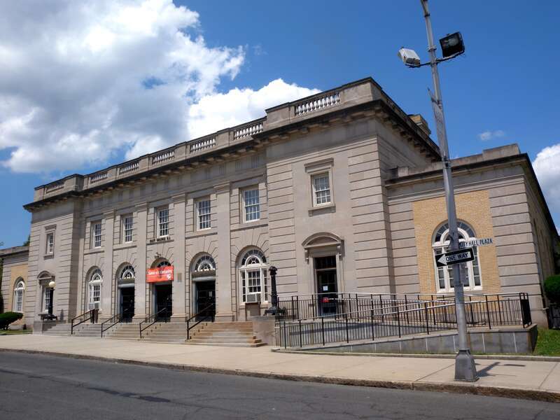 Looking northwest at Post Office of en:East Orange, New Jersey on a mostly sunny midday.