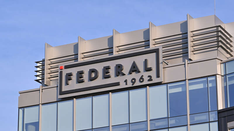 The sign at the top of the headquarters of Federal Realty Investment Trust. 909 Rose Avenue, North Bethesda, Maryland 20852.