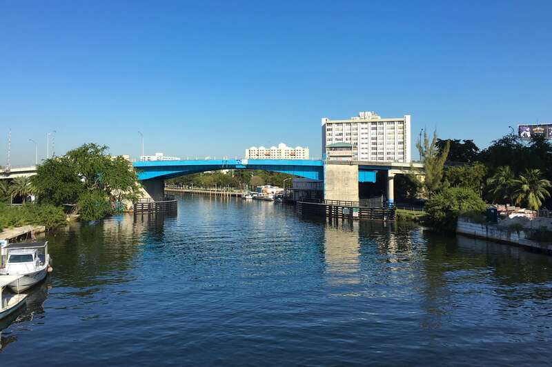 The Flagler Street Bridge, in Miami, Florida, is a 1967 double-leaf bascule bridge that carries West Flagler Street across the Miami River.  This view is from the nearby, parallel First Street Bridge.